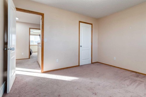 756 Luxstone Landing Sw, Airdrie, AB - Indoor Photo Showing Other Room