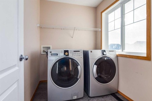 756 Luxstone Landing Sw, Airdrie, AB - Indoor Photo Showing Laundry Room