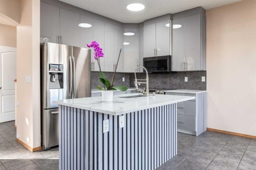 756 Luxstone Landing Sw, Airdrie, AB - Indoor Photo Showing Kitchen