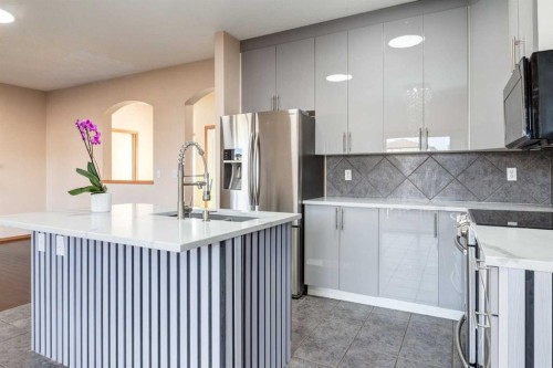 756 Luxstone Landing Sw, Airdrie, AB - Indoor Photo Showing Kitchen With Upgraded Kitchen
