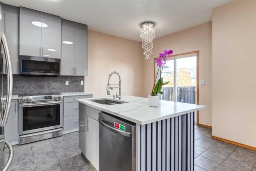756 Luxstone Landing Sw, Airdrie, AB - Indoor Photo Showing Kitchen With Upgraded Kitchen