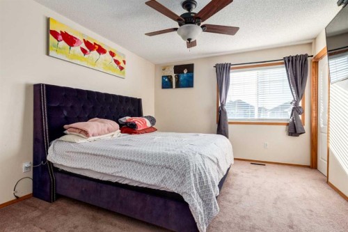 756 Luxstone Landing Sw, Airdrie, AB - Indoor Photo Showing Bedroom
