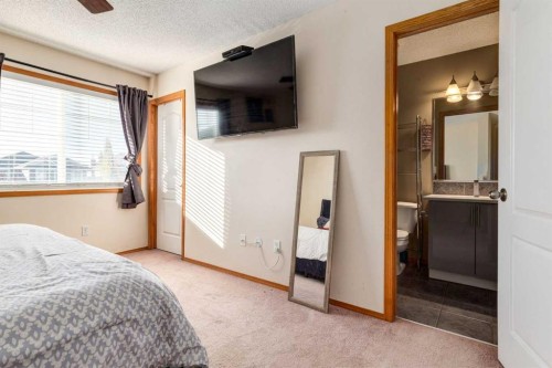 756 Luxstone Landing Sw, Airdrie, AB - Indoor Photo Showing Bedroom