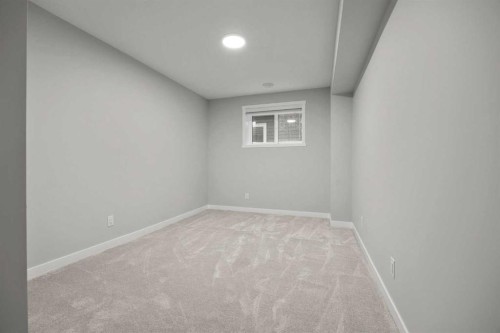 335 Sheep River Place, Okotoks, AB - Indoor Photo Showing Other Room