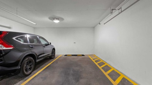 615-8505 Broadcast Avenue Sw, Calgary, AB - Indoor Photo Showing Garage