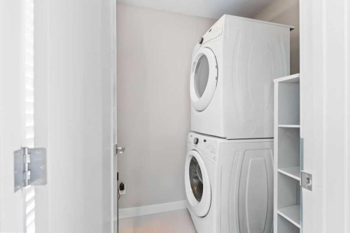 111 Evanscrest Gardens Nw, Calgary, AB - Indoor Photo Showing Laundry Room