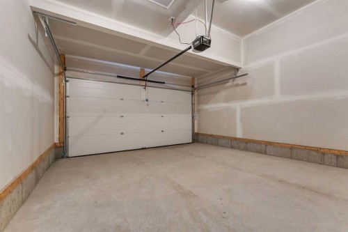 50 Setonstone Manor Se, Calgary, AB - Indoor Photo Showing Garage
