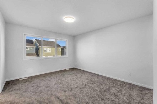 50 Setonstone Manor Se, Calgary, AB - Indoor Photo Showing Other Room