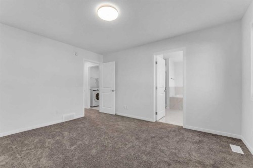 50 Setonstone Manor Se, Calgary, AB - Indoor Photo Showing Other Room