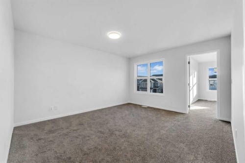 50 Setonstone Manor Se, Calgary, AB - Indoor Photo Showing Other Room
