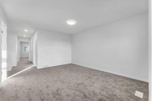50 Setonstone Manor Se, Calgary, AB - Indoor Photo Showing Other Room