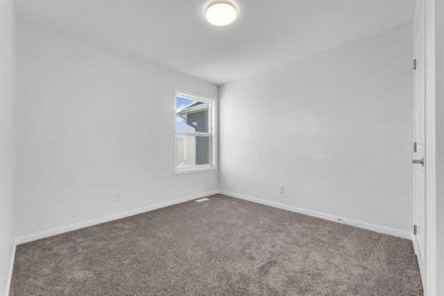 50 Setonstone Manor Se, Calgary, AB - Indoor Photo Showing Other Room