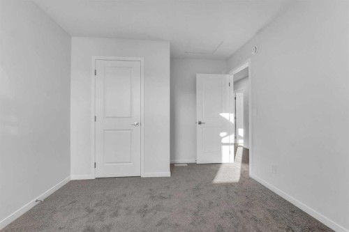 50 Setonstone Manor Se, Calgary, AB - Indoor Photo Showing Other Room
