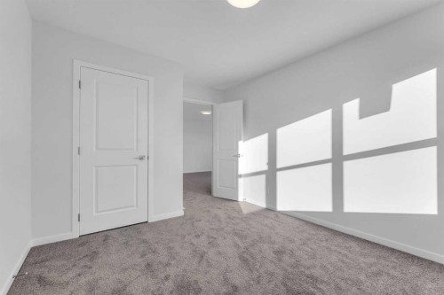50 Setonstone Manor Se, Calgary, AB - Indoor Photo Showing Other Room