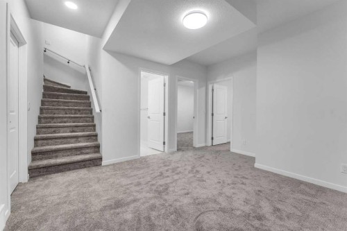 50 Setonstone Manor Se, Calgary, AB - Indoor Photo Showing Other Room