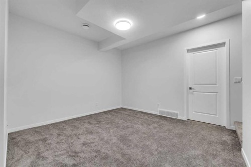 50 Setonstone Manor Se, Calgary, AB - Indoor Photo Showing Other Room