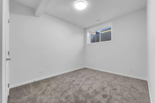 50 Setonstone Manor Se, Calgary, AB - Indoor Photo Showing Other Room