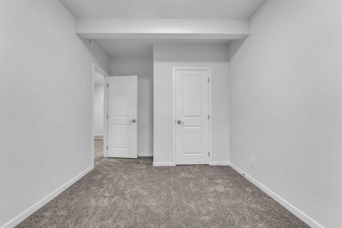50 Setonstone Manor Se, Calgary, AB - Indoor Photo Showing Other Room