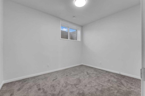 50 Setonstone Manor Se, Calgary, AB - Indoor Photo Showing Other Room