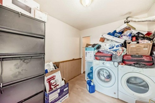 11 Falsby Way Ne, Calgary, AB - Indoor Photo Showing Laundry Room