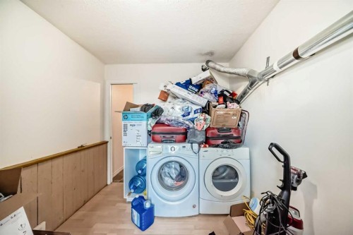 11 Falsby Way Ne, Calgary, AB - Indoor Photo Showing Laundry Room