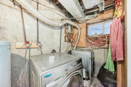 11 Falsby Way Ne, Calgary, AB - Indoor Photo Showing Laundry Room