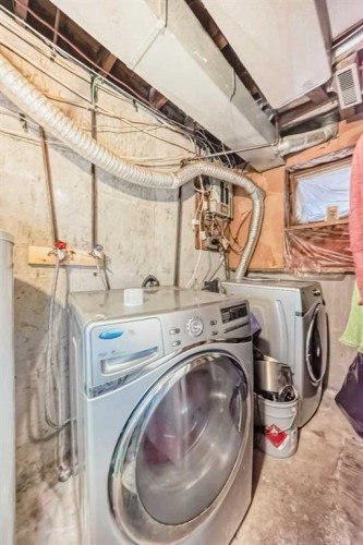11 Falsby Way Ne, Calgary, AB - Indoor Photo Showing Laundry Room