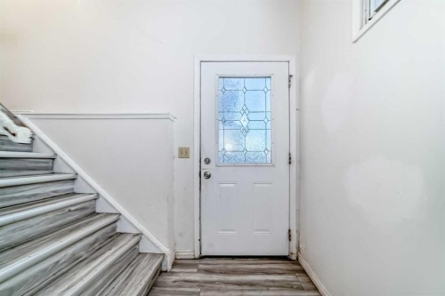 11 Falsby Way Ne, Calgary, AB - Indoor Photo Showing Other Room