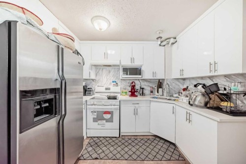 11 Falsby Way Ne, Calgary, AB - Indoor Photo Showing Kitchen