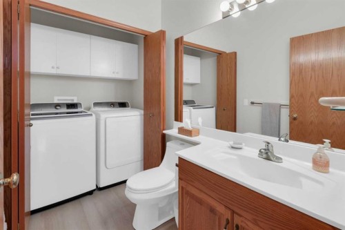 50 Christie Gardens Sw, Calgary, AB - Indoor Photo Showing Laundry Room