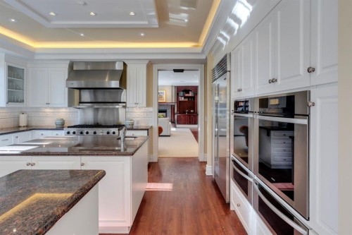 126 Eagle Ridge Drive Sw, Calgary, AB - Indoor Photo Showing Kitchen With Double Sink With Upgraded Kitchen