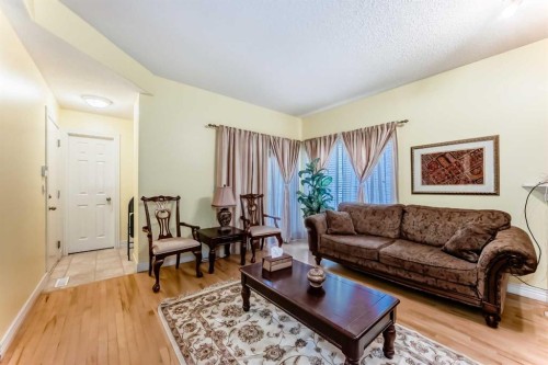 187 Bridlewood View Sw, Calgary, AB - Indoor Photo Showing Living Room