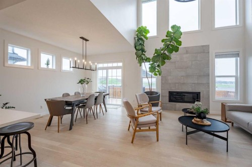 2148 Ravensdun Crescent Se, Airdrie, AB - Indoor With Fireplace