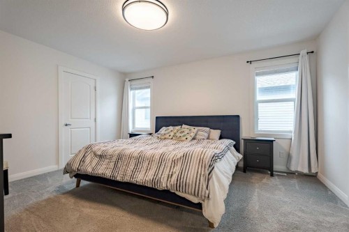 2148 Ravensdun Crescent Se, Airdrie, AB - Indoor Photo Showing Bedroom