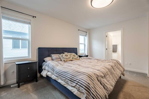 2148 Ravensdun Crescent Se, Airdrie, AB - Indoor Photo Showing Bedroom