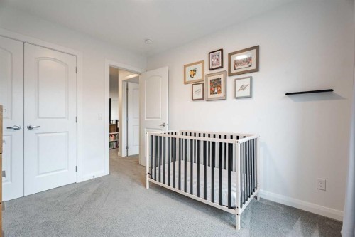 2148 Ravensdun Crescent Se, Airdrie, AB - Indoor Photo Showing Bedroom