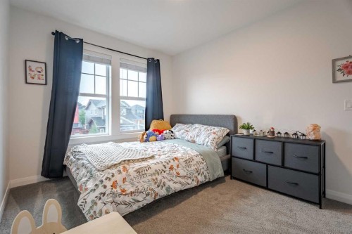 2148 Ravensdun Crescent Se, Airdrie, AB - Indoor Photo Showing Bedroom