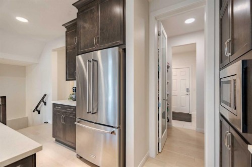 2148 Ravensdun Crescent Se, Airdrie, AB - Indoor Photo Showing Kitchen With Stainless Steel Kitchen