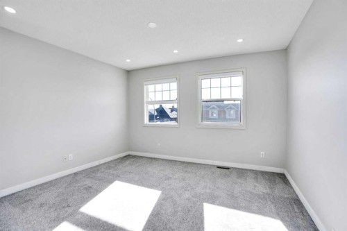 85 Boulder Creek Manor Se, Langdon, AB - Indoor Photo Showing Other Room