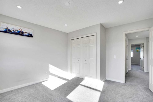 85 Boulder Creek Manor Se, Langdon, AB - Indoor Photo Showing Other Room