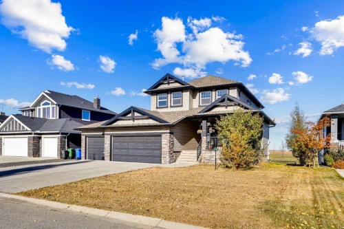 85 Boulder Creek Manor Se, Langdon, AB - Outdoor With Facade
