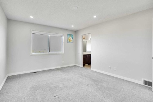 85 Boulder Creek Manor Se, Langdon, AB - Indoor Photo Showing Other Room