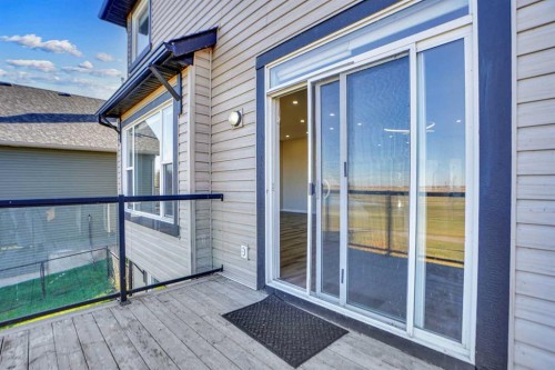 85 Boulder Creek Manor Se, Langdon, AB - Outdoor With Balcony With Exterior