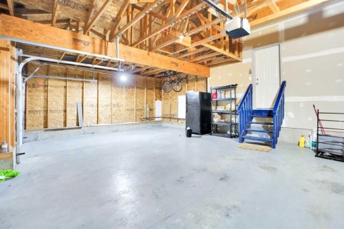 85 Boulder Creek Manor Se, Langdon, AB - Indoor Photo Showing Basement