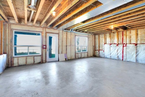 85 Boulder Creek Manor Se, Langdon, AB - Indoor Photo Showing Basement