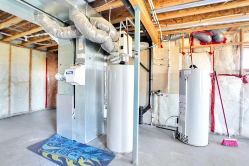 85 Boulder Creek Manor Se, Langdon, AB - Indoor Photo Showing Basement