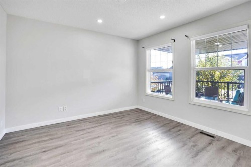 85 Boulder Creek Manor Se, Langdon, AB - Indoor Photo Showing Other Room