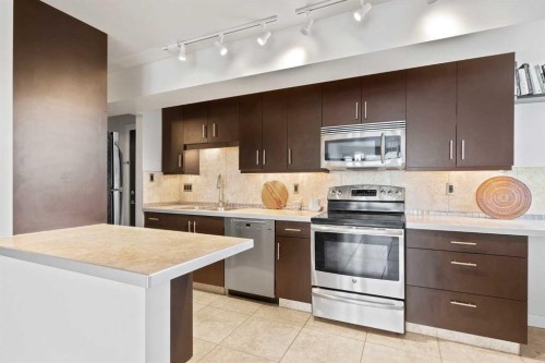 302-2602 14A Street Sw, Calgary, AB - Indoor Photo Showing Kitchen With Stainless Steel Kitchen
