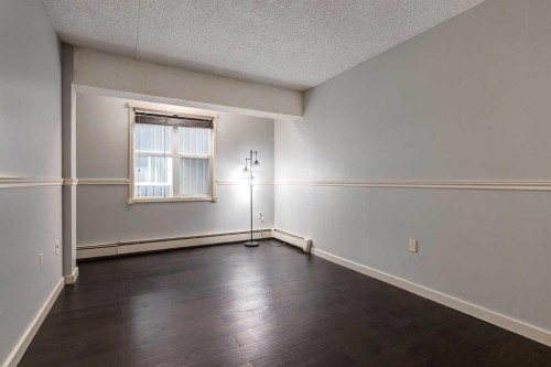 205-120 15 Avenue Sw, Calgary, AB - Indoor Photo Showing Other Room