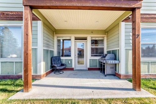 1321 18 Avenue, Didsbury, AB - Outdoor With Deck Patio Veranda